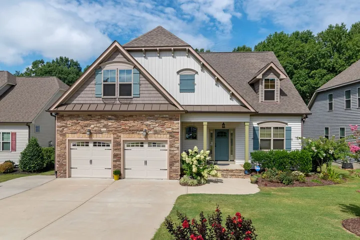 Craftsman home with stone front
